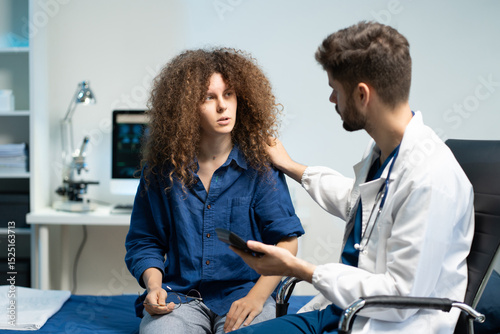 Papier peint Stressed woman patient are treated by a psychologist or psychiatrist in a psychiatric clinic or hospital