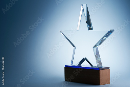star crystal trophy against blue background