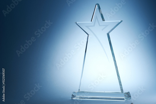 star crystal trophy against blue background