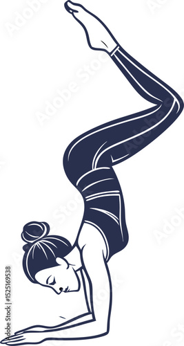 Woman in activewear performing a yoga handstand pose