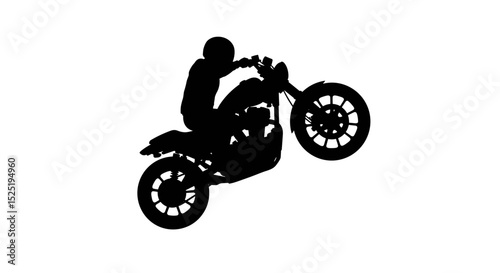 Silhouette of a motorcyclist performing a wheelie on a bike  