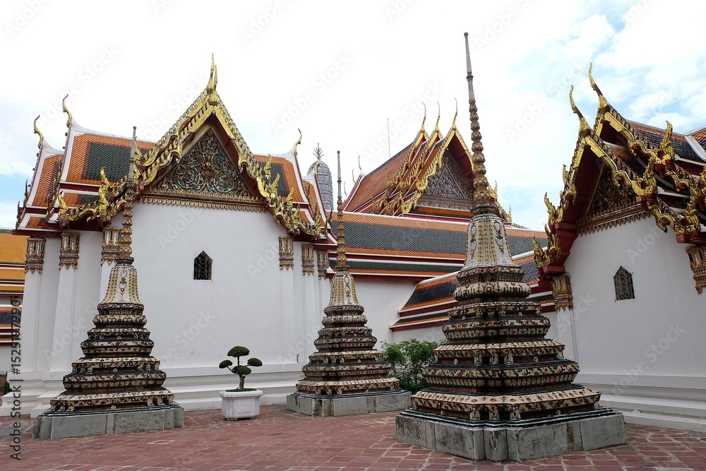Fototapeta premium Wat Pho or Pho temple, an ancient temple, Buddha, Wat Phra Chetuphon Wimon Mangkhalaram, Buddhism, religion, architecture, exterior, Bangkok, Thailand, Thailand Destination