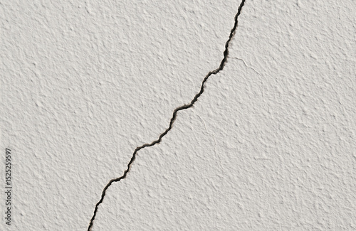 Visible crack on textured wall indicating possible structural damage or age-related deterioration