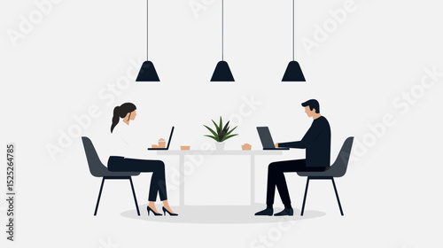 Coworkers sitting at a table working on laptops in a modern office  