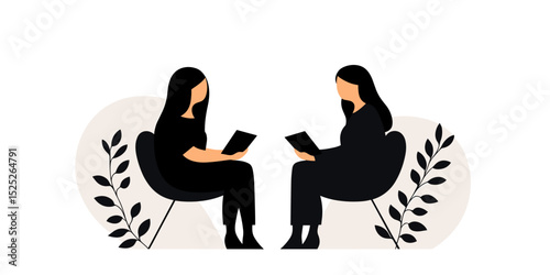 Two women seated and talking while holding tablets in a modern setting  