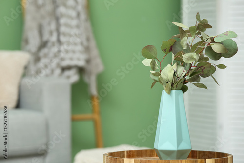 Blue vase with eucalyptus b...