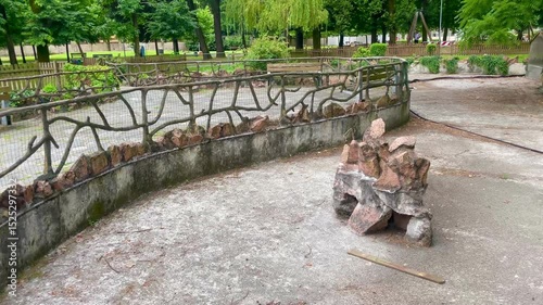 An abandoned and dried-up pond in a city park. San Donato Milanese, Italy. June 8, 2025