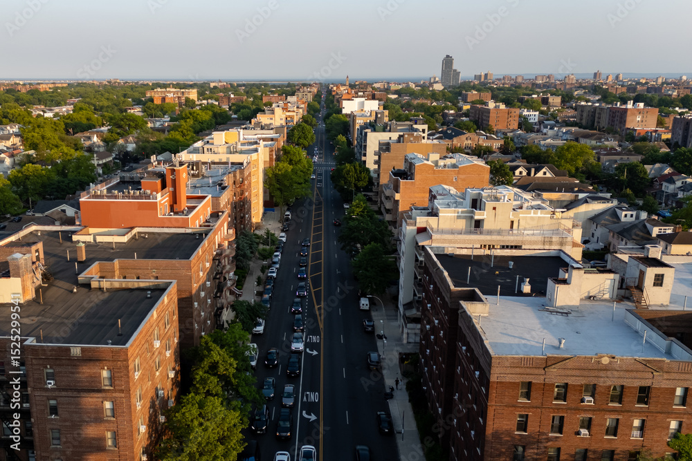 Fototapeta premium Cityscape from above with bustling streets and towering skyscrapers.