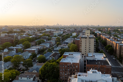 City buildings sprawl below, as seen from a high angle.
