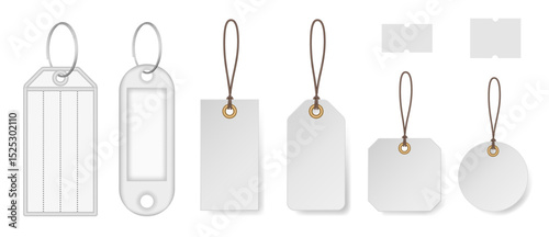 Set of white price tags and keyrings. Price stickers. Luggage tag. Cardboard label for clothes. Key tags with split ring and window. Keychains