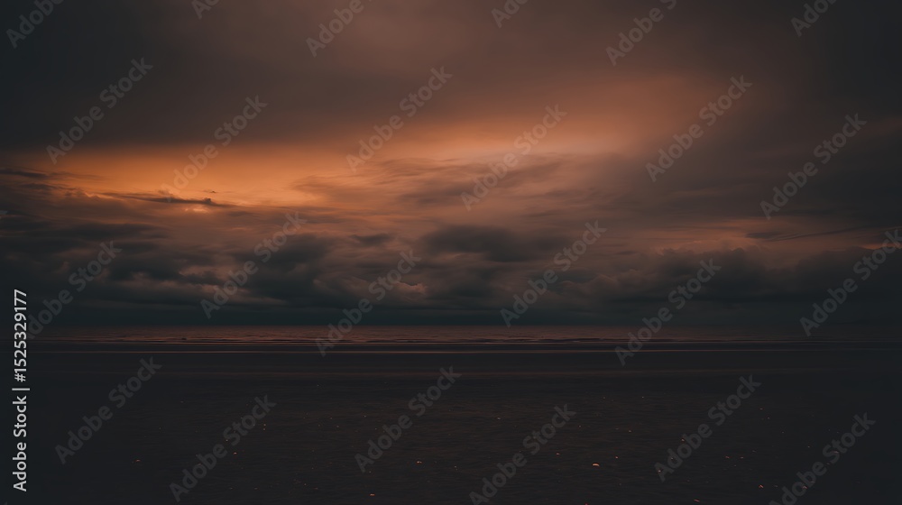 Fototapeta premium Dramatic sunset sky over the ocean