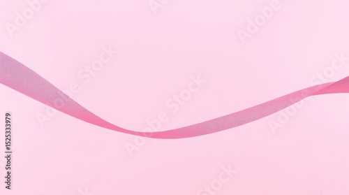 Pink background with a wavy pink ribbon crossing the frame diagonally