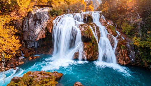 beautiful waterfall with a long exposure shot; water flowing over the rocks