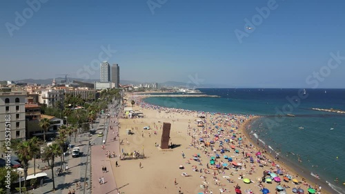 Beach of Barcelona in sunny weather in summer arial view from a drone