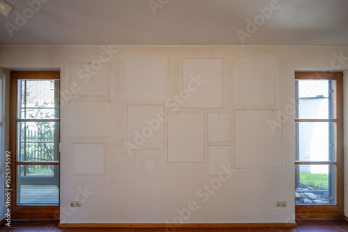 empty room with window and wooden floor