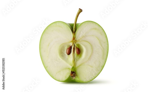 A cross section of a green apple reveals its core and seeds