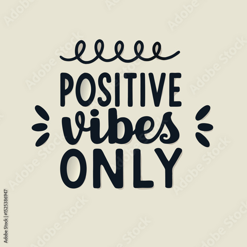 Inspirational typography with the phrase positive vibes only on a cream colored background