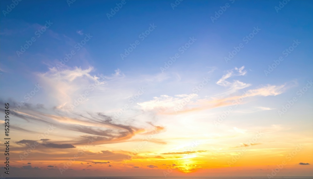 Fototapeta premium Serene Sunset Over Ocean with Colorful Sky and Soft Cloud Patterns
