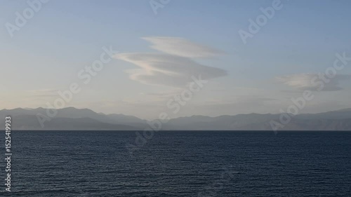 Experience a breathtaking time lapse landscape of Gulf of Corinth in Greece. Cloud formation over sea