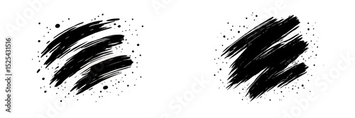 Abstract black brushstrokes with splatter effect on a white background display artistic expression and creativity