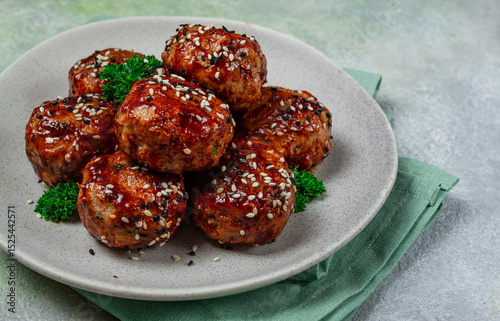 Tsukune, Japanese meatballs, minced chicken, fried on a skewer, with yakitori sauce, homemade, no people,