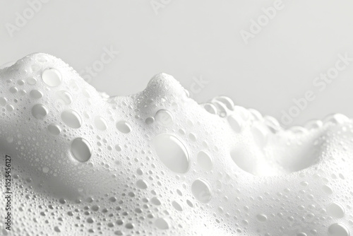 Closeup of white foam with bubbles texture