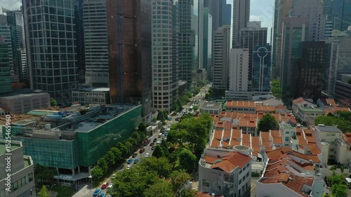 sunny day flight over singapore city center downtown traffic street aerial panorama 4k 