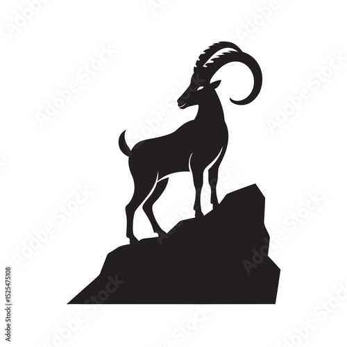 Ibex Standing Proud On Mountain Cliff