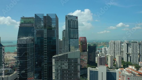 day time singapore city downtown modern office buildings port bay aerial panorama 4k 