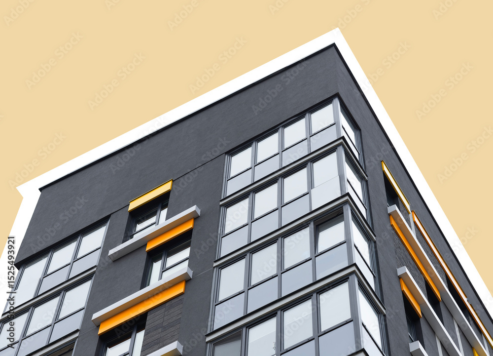 Fototapeta premium Modern highrise apartment building with glass windows and structured facade. Urban residential block