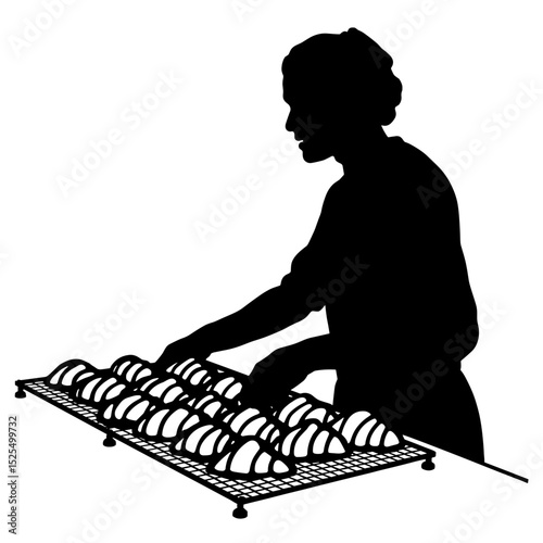 Silhouette of baker arranging croissants on rack, artisan bakery preparation