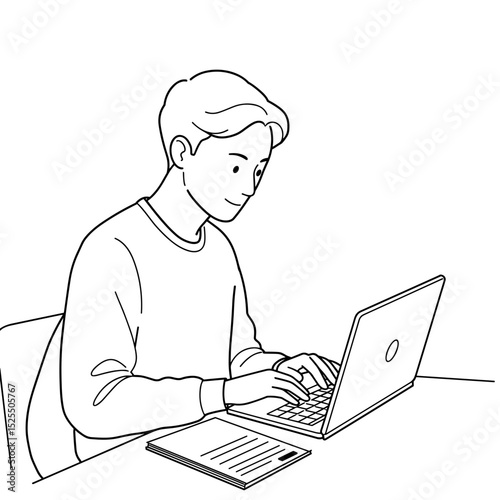 student working on laptop while taking notes at desk with concentration