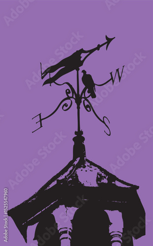 Bird sat on vintage weather vane