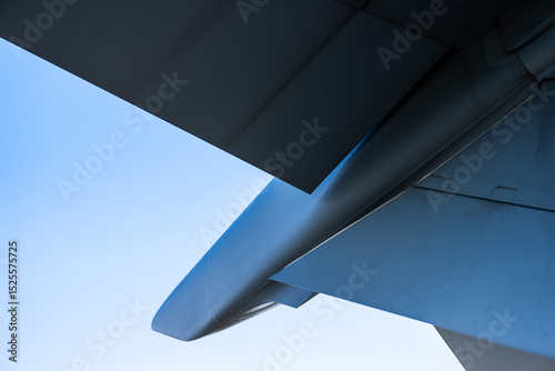 Фотография close-up of military aircraft stabilizer and flaps.