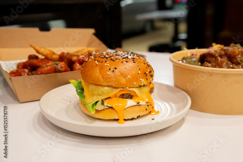 Korean deep dried chicken with sweet buns and spicy sauce.