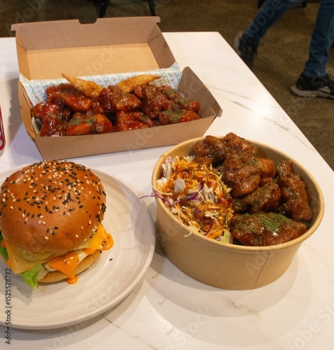Korean deep dried chicken with sweet buns and spicy sauce.
