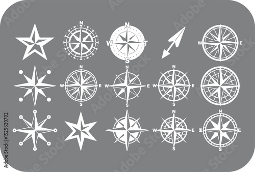 Assortment of White Compass Rose and Star Icons on a Gray Background Featuring Nautical Symbols and Directional Indicators for Navigation and Design Purposes