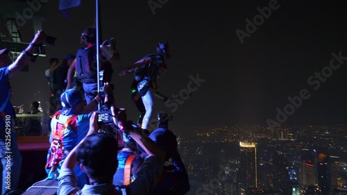 night illumination kuala lumpur city center famous view point tower base jumping competition panorama 4k malaysia