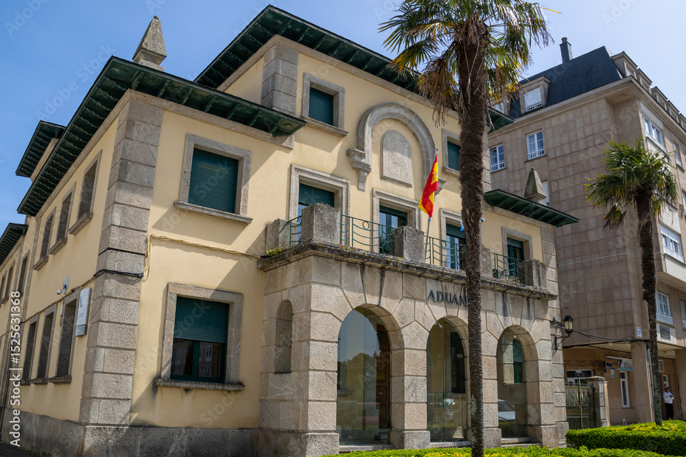 Naklejka premium Architecture of the Customs and Excise Administration in Ribadeo, Spain. Shot from Plaza España in the heart of the town.