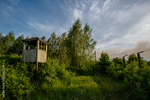 Wallpaper Mural Old observation tower in abandoned overgrown Soviet Russian prison complex or military base Torontodigital.ca