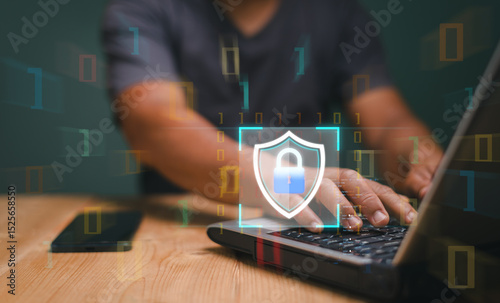 Cyber security and privacy concepts, Personal data security. Protecting information from cyber attacks, Businessman using laptop with virtual shield screen for global internet security.
