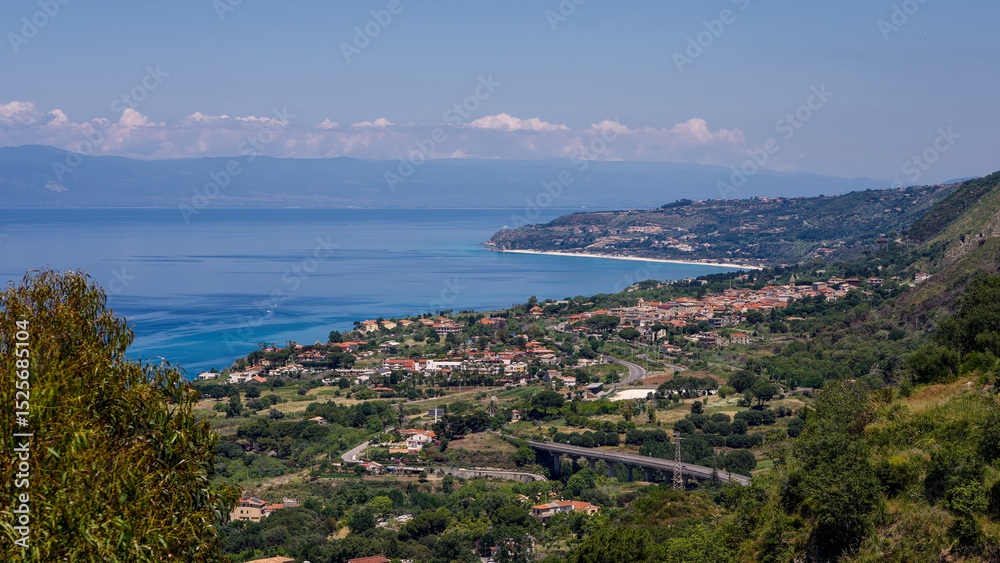 Naklejka premium Panoramic view of Tropea town and its coastline bathed by Tyrrhenian Sea in Calabria, Southern Italy