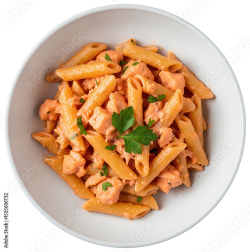 penne pasta with salmon and vodka in a white dish on transparent background, traditional italian recipe of food