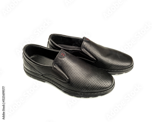 Black leather shoes are presented on a white background, the execution of which is distinguished by the meticulous attention to detail,