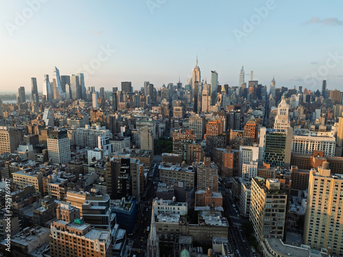 Aerial wide angle skyline of New York City at sunrise, clear sky
