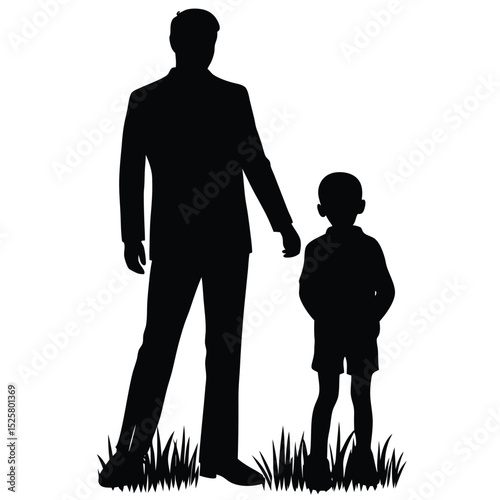 Silhouette of a father and son standing together on a bed of grass for family portrait