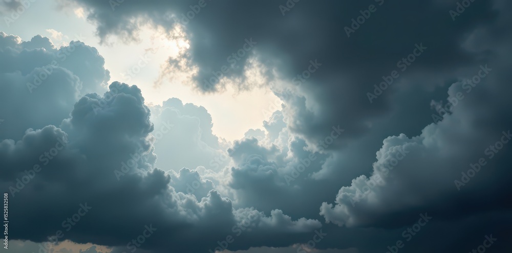 Obraz premium Turbulent cloudscape, swirling grey and black , grey clouds, windy