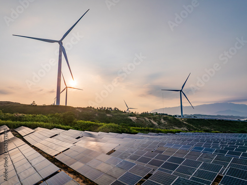 Solar photovoltaic windmill wind energy at sunset