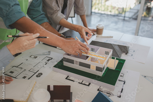 Papier peint architects and engineers are discussing the design and structure of the upcoming