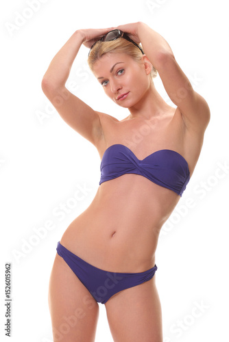 Attractive young woman posing in stylish bikini